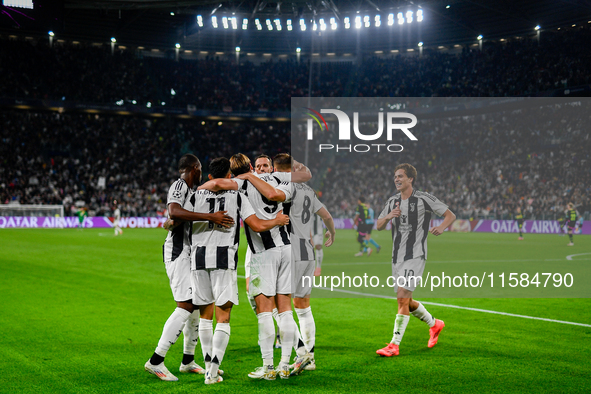 The Juventus team celebrates after the goal of 3-0 during the UEFA Champions League 2024/25 League Phase MD1 match between Juventus and PSV...