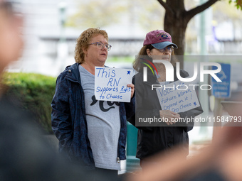 Supporters of pro-choice listen to Governor Healey (D-MA) speak at a Harris-Walz Reproductive Freedom press conference in Harrisburg, Pennsy...