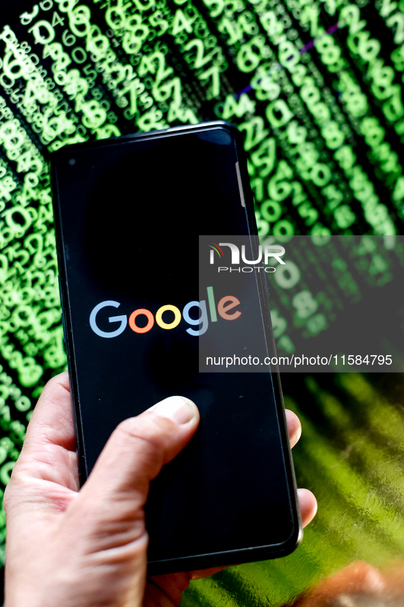 In this photo illustration, the Nvidia logo is seen displayed on a smartphone screen against a computer screen displaying a matrix image, as...