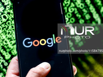 In this photo illustration, the Nvidia logo is seen displayed on a smartphone screen against a computer screen displaying a matrix image, as...