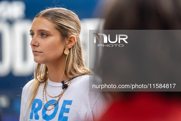 Activist Hadley Duvall, 22, attends a Harris-Walz Fighting for Reproductive Freedom press conference at the Pennsylvania State Capitol in Ha...