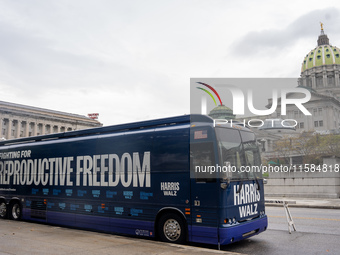 The Harris-Walz Fighting for Reproductive Freedom bus parks at the Pennsylvania State Capitol in Harrisburg, Pennsylvania, United States, on...