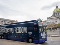 The Harris-Walz Fighting for Reproductive Freedom bus parks at the Pennsylvania State Capitol in Harrisburg, Pennsylvania, United States, on...