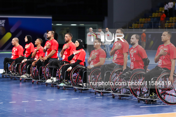 Egypt's national team sings the national anthem before the start of their match against India at the World Wheelchair Handball Championship...