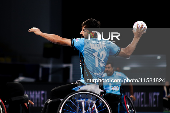 India's player shoots the ball towards the goal during the India vs. Egypt match at the World Wheelchair Handball Championship in Egypt, on...