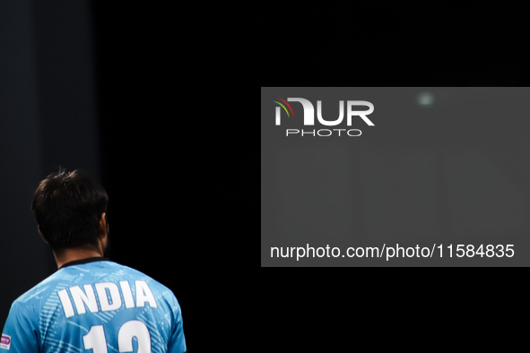 India's team player looks at the scoreboard during the Egypt vs India match at the World Wheelchair Handball Championship in City, Country,...