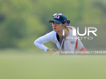 GAINESVILLE, VIRGINIA - SEPTEMBER 15: Rose Zhang of the United States lines up her putt on the 12th green during the final round of the Solh...