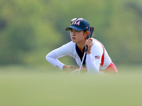 GAINESVILLE, VIRGINIA - SEPTEMBER 15: Rose Zhang of the United States lines up her putt on the 12th green during the final round of the Solh...