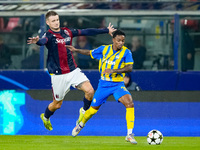 Newerton of FC Shakhtar Donetsk and Stefan Posch of Bologna FC compete for the ball during the UEFA Champions League 2024/25 League Phase MD...