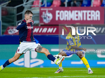 Newerton of FC Shakhtar Donetsk and Stefan Posch of Bologna FC compete for the ball during the UEFA Champions League 2024/25 League Phase MD...