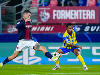 Newerton of FC Shakhtar Donetsk and Stefan Posch of Bologna FC compete for the ball during the UEFA Champions League 2024/25 League Phase MD...