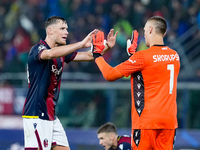 Sam Beukema of Bologna FC and Lukasz Skorupski of Bologna FC during the UEFA Champions League 2024/25 League Phase MD1 match between Bologna...