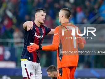 Sam Beukema of Bologna FC and Lukasz Skorupski of Bologna FC during the UEFA Champions League 2024/25 League Phase MD1 match between Bologna...