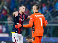 Sam Beukema of Bologna FC and Lukasz Skorupski of Bologna FC during the UEFA Champions League 2024/25 League Phase MD1 match between Bologna...