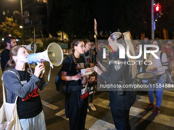 Israeli protesters block Herzog Street in West Jerusalem, near Prime Minister Netanyahu's residence, calling for an end to the war and the i...