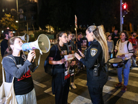 Israeli protesters block Herzog Street in West Jerusalem, near Prime Minister Netanyahu's residence, calling for an end to the war and the i...