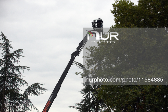 Policemen of the CNAMO, a special unit, prepare to try to catch a 'Ecureuil' (i.e., 'squirrel') in a tree on the 'Verger' ZAD. For the secon...