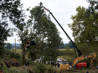 Members of the CNAMO prepare to catch a 'squirrel' in the 'Verger' ZAD. For the second day, Gendarmerie and CNAMO try to dislodge 'squirrels...