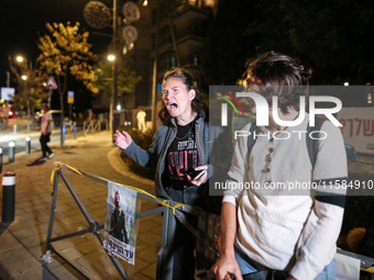 Israeli protesters block Herzog Street in West Jerusalem, near Prime Minister Netanyahu's residence, calling for an end to the war and the i...