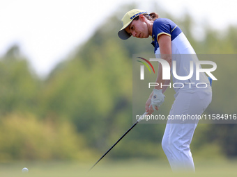 GAINESVILLE, VIRGINIA - SEPTEMBER 15: Carlota Ciganda of Team Europe chips to the 12th green during the final round of the Solheim Cup at Ro...