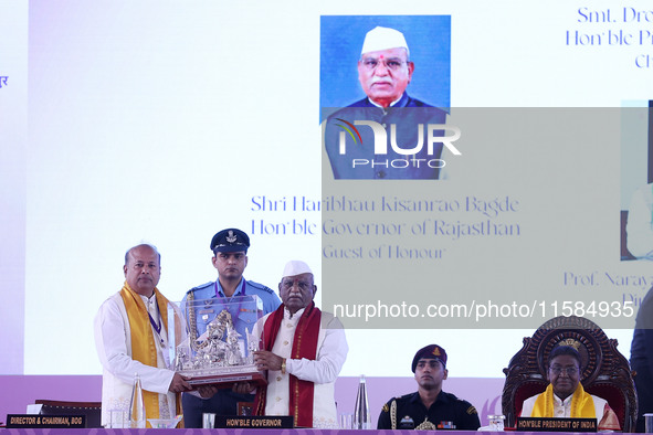 Rajasthan Governor Haribhau Kisanrao Bagde is welcomed by Director MNIT Prof. Narayana Prasad Padhy during the 18th Convocation ceremony at...