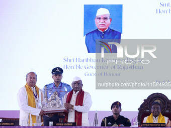 Rajasthan Governor Haribhau Kisanrao Bagde is welcomed by Director MNIT Prof. Narayana Prasad Padhy during the 18th Convocation ceremony at...