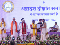 President Droupadi Murmu presents certificates to students during the 18th Convocation ceremony at Malviya National Institute of Technology...