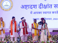 President Droupadi Murmu presents certificates to students during the 18th Convocation ceremony at Malviya National Institute of Technology...