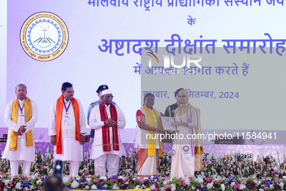 President Droupadi Murmu presents certificates to students during the 18th Convocation ceremony at Malviya National Institute of Technology...