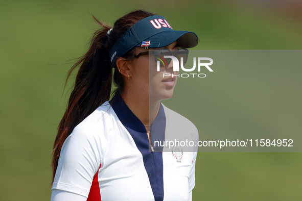 GAINESVILLE, VIRGINIA - SEPTEMBER 15: Alison Lee of the United States walks to the 13th green during the final round of the Solheim Cup at R...