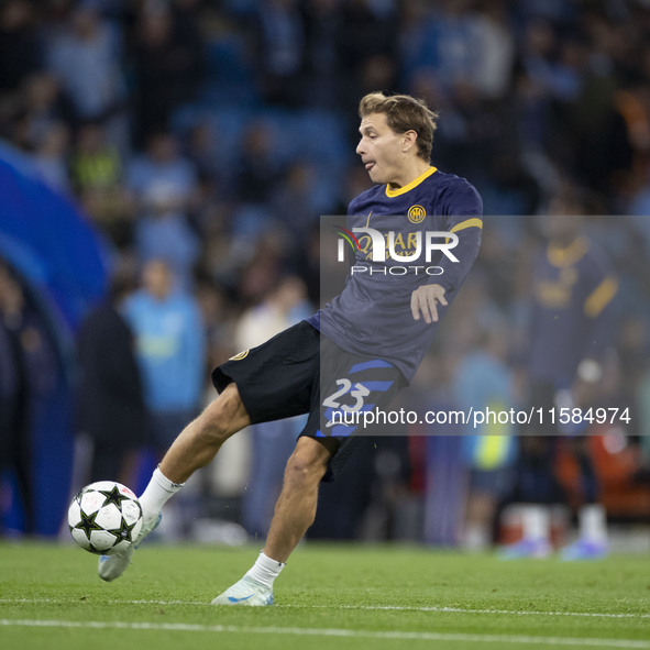 Nicolo Barella #23 of Inter Milan warms up during the UEFA Champions League Group Stage match between Manchester City and Football Club Inte...