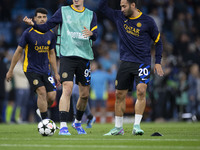 Alessandro Bastoni #95 of Inter Milan warms up during the UEFA Champions League Group Stage match between Manchester City and Football Club...