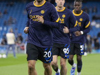 Hakan Calhanoglu #20 of Inter Milan warms up during the UEFA Champions League Group Stage match between Manchester City and Football Club In...