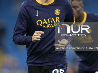 Alessandro Bastoni #95 of Inter Milan warms up during the UEFA Champions League Group Stage match between Manchester City and Football Club...