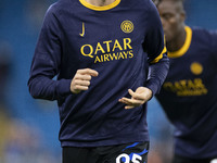 Alessandro Bastoni #95 of Inter Milan warms up during the UEFA Champions League Group Stage match between Manchester City and Football Club...