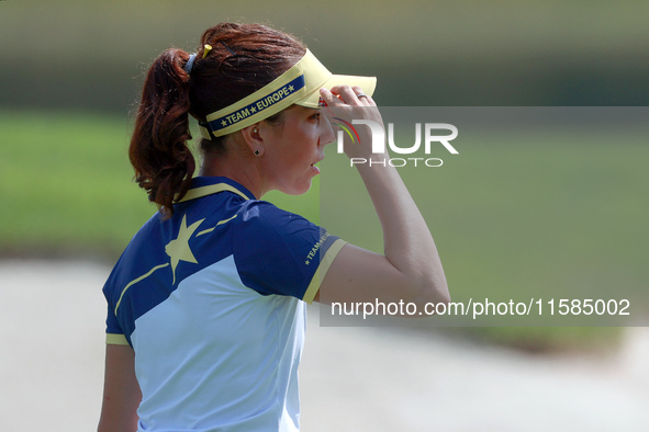 GAINESVILLE, VIRGINIA - SEPTEMBER 15: Georgia Hall of Team Europe walks to the 13th green during the final round of the Solheim Cup at Rober...