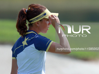 GAINESVILLE, VIRGINIA - SEPTEMBER 15: Georgia Hall of Team Europe walks to the 13th green during the final round of the Solheim Cup at Rober...