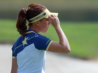 GAINESVILLE, VIRGINIA - SEPTEMBER 15: Georgia Hall of Team Europe walks to the 13th green during the final round of the Solheim Cup at Rober...