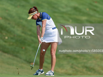 GAINESVILLE, VIRGINIA - SEPTEMBER 15: Georgia Hall of Team Europe hits on  the 13th fairway during the final round of the Solheim Cup at Rob...