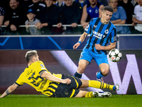 Borussia Dortmund defender Niklas Sule and Club Brugge forward Christos Tzolis during the match between Club Brugge and Borussia Dortmund at...