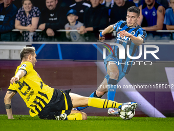 Borussia Dortmund defender Niklas Sule and Club Brugge forward Christos Tzolis during the match between Club Brugge and Borussia Dortmund at...