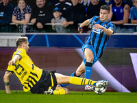 Borussia Dortmund defender Niklas Sule and Club Brugge forward Christos Tzolis during the match between Club Brugge and Borussia Dortmund at...