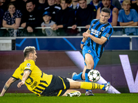 Borussia Dortmund defender Niklas Sule and Club Brugge forward Christos Tzolis during the match between Club Brugge and Borussia Dortmund at...