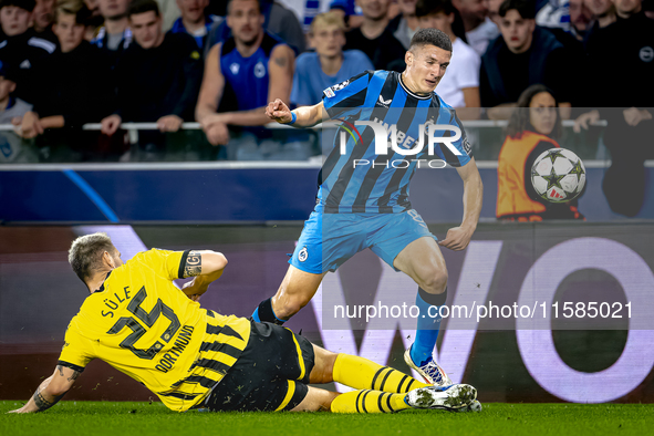 Borussia Dortmund defender Niklas Sule and Club Brugge forward Christos Tzolis during the match between Club Brugge and Borussia Dortmund at...