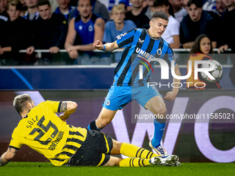 Borussia Dortmund defender Niklas Sule and Club Brugge forward Christos Tzolis during the match between Club Brugge and Borussia Dortmund at...