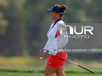 GAINESVILLE, VIRGINIA - SEPTEMBER 15: Megan Khang of the United States walks on the 13th green during the final round of the Solheim Cup at...