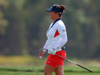 GAINESVILLE, VIRGINIA - SEPTEMBER 15: Megan Khang of the United States walks on the 13th green during the final round of the Solheim Cup at...