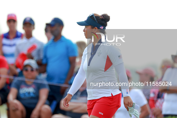 GAINESVILLE, VIRGINIA - SEPTEMBER 15: Megan Khang of the United States walks on the 13th green during the final round of the Solheim Cup at...