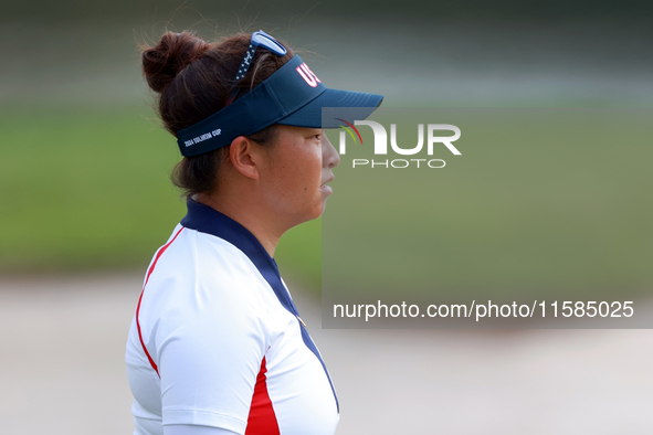 GAINESVILLE, VIRGINIA - SEPTEMBER 15: Megan Khang of the United States walks to the 13th green during the final round of the Solheim Cup at...