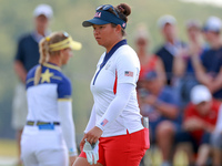 GAINESVILLE, VIRGINIA - SEPTEMBER 15: Megan Khang of the United States walks on the 13th green with Emily Kristine Pedersen of Team Europe i...